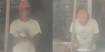 Chef spitting on rotis